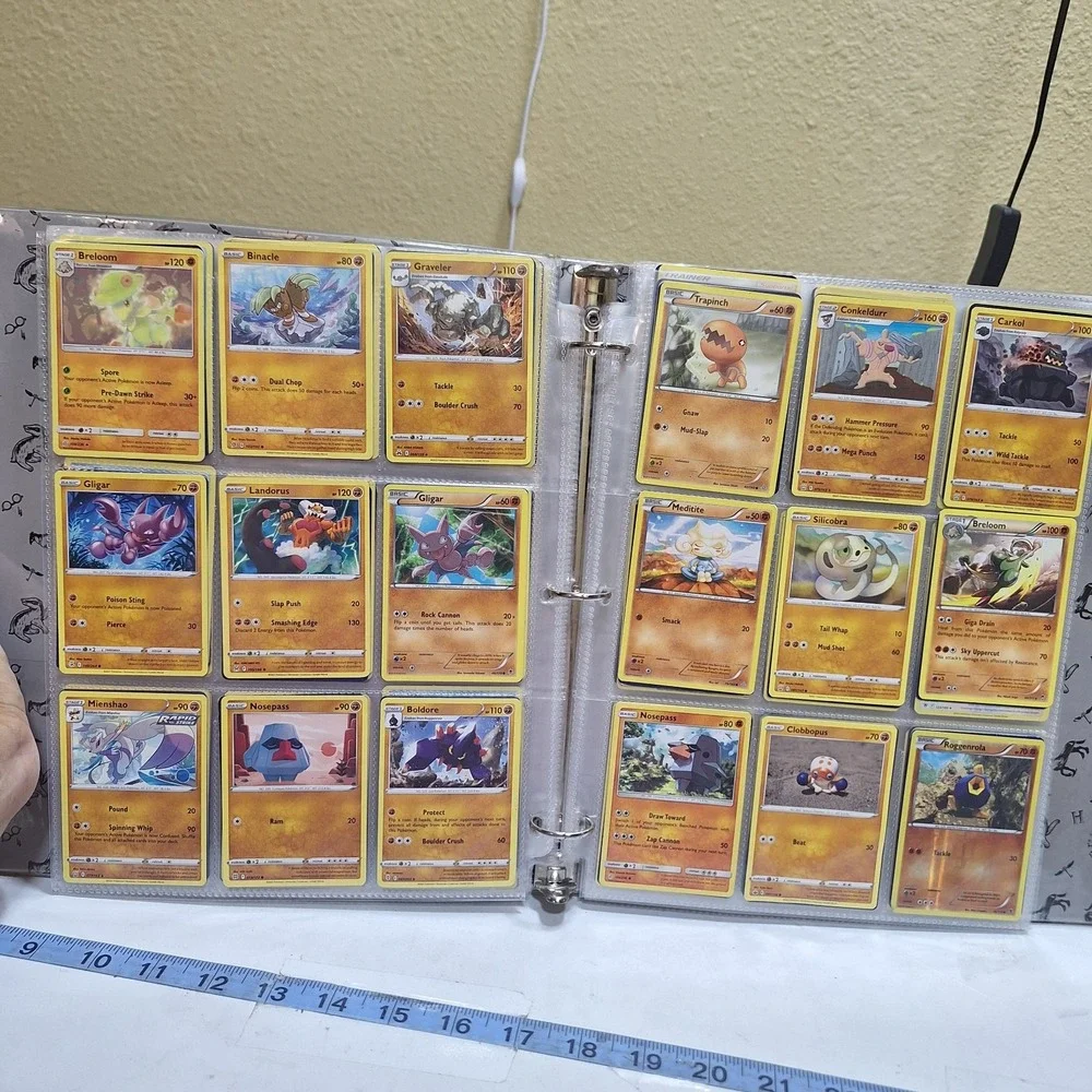 Pokémon TCG binder collection lot with approximately 171 cards from multiple set
